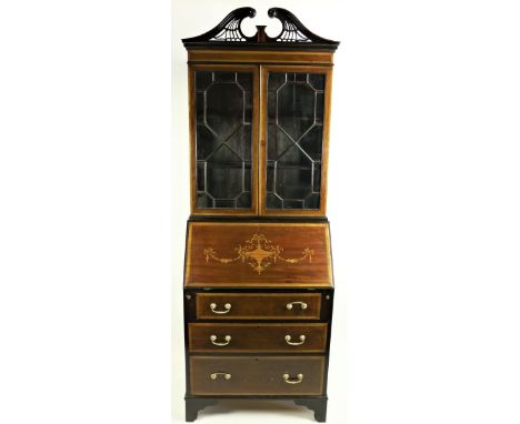 An Edwardian inlaid and crossbanded mahogany Bureau Bookcase, the pierced and moulded swan neck pediment above two astragal g