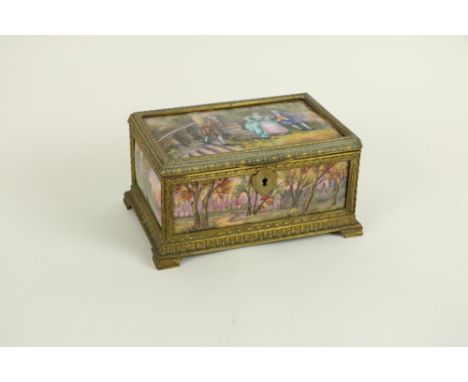 A French porcelain and gilt brass Jewellery Casket, the top decorated&nbsp; with figures on a balcony and the lower panels de