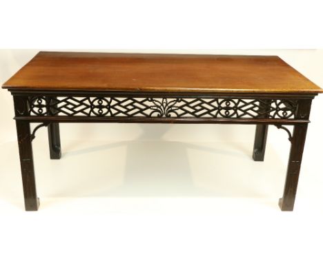 An exceptional pair of Irish Georgian period mahogany Side or Serving Tables, in the Chinese Chippendale style, each with a r