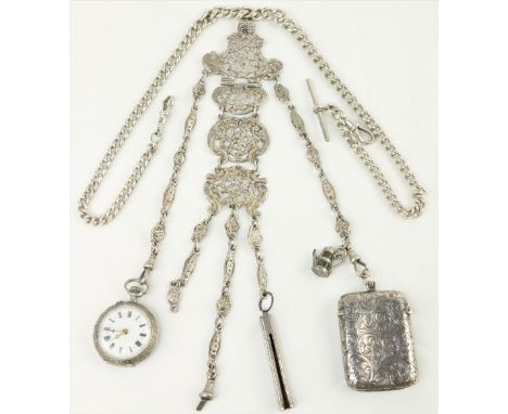 A very good late 19th Century / early 20th Century decorated pierced and engraved silver Chatelaine, with attachments, attrac