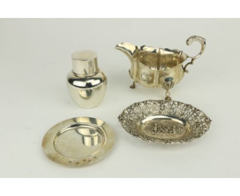 A Continental silver pierced and decorated Bon Bon Dish,&nbsp;the central embossed panel with cherubs, hallmarked; a small Ir