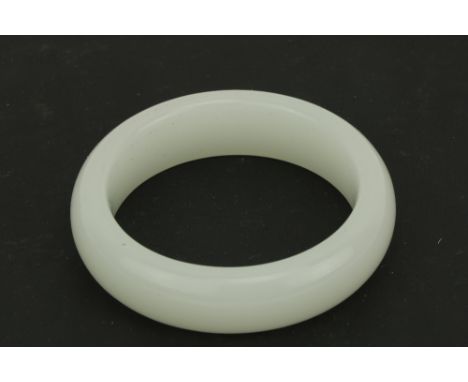 An attractive plain Nephrite white jade Chinese Bangle Bracelet, approx. 8cms diameter. (1) 
