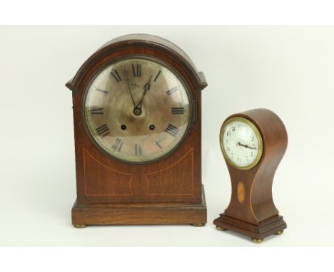 A small Edwardian balloon shaped inlaid Table Clock, 24cms (9 1/2"); together with another larger inlaid oak cased Mantle Clo