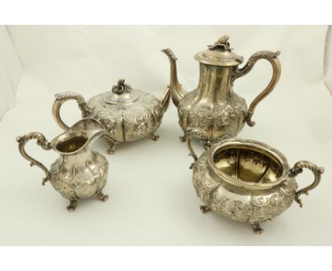 A Victorian four piece silver Tea Service, London 1839 by R. Hennell, comprising: a pumpkin shaped crested teapot with acorn 