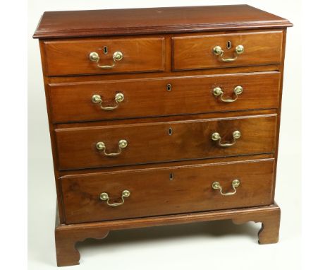 A George III period mahogany Chest,&nbsp;with four long graduating drawers and raised on bracket feet, 87cms (34 1/2"). (1) 