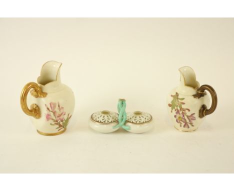 A Royal Worcester flat back porcelain Jug, with floral decoration and reeded handle, Rd NO. 29115, 1094, 14cms (5 1/2"); a sm