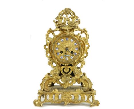 An elegant 19th Century French Clock, by Roblin of Paris, the overall body decorated in the rococo taste with flowers and 'C'