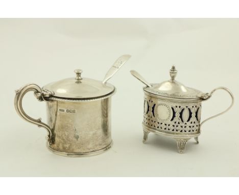 An oval bright cut and pierced silver Mustard Pot, in the Adams style, Birmingham 1892, another cylindrical silver Mustard Po