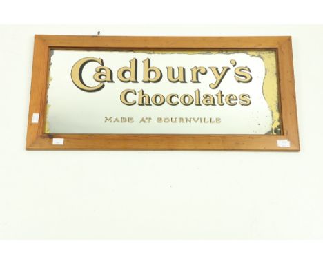 A Vintage plated Advertisement Mirror, oblong for 'Cadbury's Chocolates, made at Bournville,' approx. 24cms x 60cms (9 1/2" x