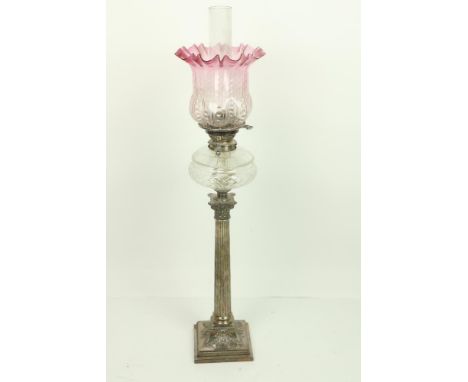 A good heavy silver plated Corinthian style Table Oil Lamp,&nbsp;with reeded column on square flared stepped and chased base 