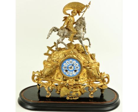 A gilt metal and silvered French Mantle Clock, the top surmounted with a Medieval General in full armour on horseback, above 