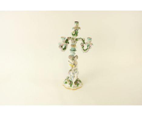 A 19th Century Dresden porcelain&nbsp;flower encrusted Candelabrum, modelled with mother and child under four encrusted rusti