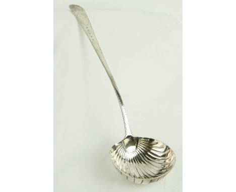 An Irish George III silver bright cut Soup Ladle, with shell bowl, by Michael Keating, Dublin 1794. (1) 