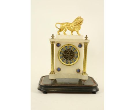 A late 19th Century French onyx and gilt metal Mantle Clock,&nbsp;of architectural design surmounted with a lion above a pain