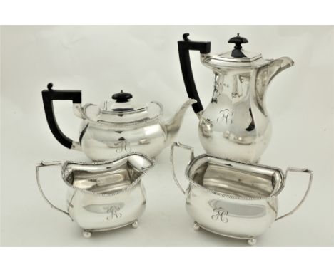 A four piece silver Tea and Coffee Service, Chester 1926, comprising coffee pot, teapot, sugar bowl and cream jug, each of og