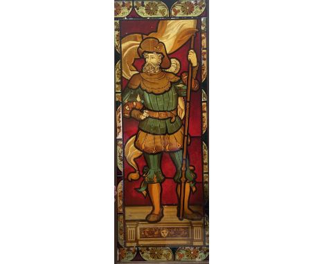 A painted printed transfer glass Panel, depicting a Cavalier wearing armour holding a flagstaff, with floral surround, approx