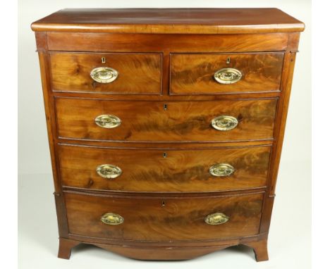 A Regency period bow fronted mahogany Chest, with three long and two short drawers raised on splayed bracket feet, 104cms (41
