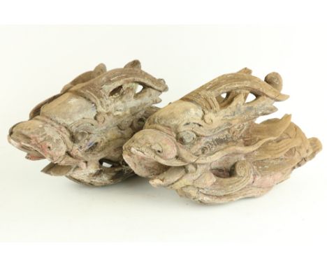 An early carved and polychrome painted dragon Head, a boat figure Head of architectural element, carved with flames and scrol