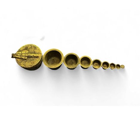 Santo Andre, Cape Verde 1856  A set of brass cup weights.SANTO ANDRE - 1856 Cape Verde legend has it that a fabulously rich t