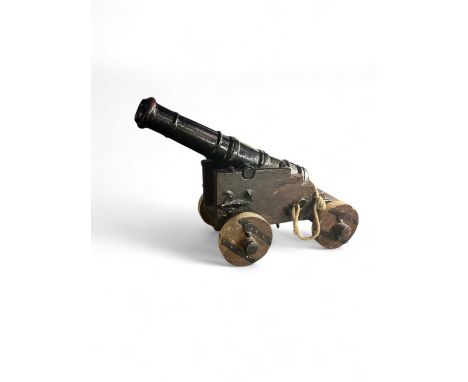Cannon  An iron 1 1/2" bore cannon on carriageCannon 80cm including button Muzzle face 7cm   Cannon 80cm including button, Mu