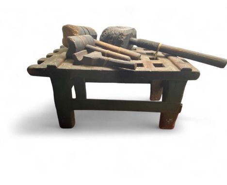 A 19th century sailmaker's small bench  Constructed from a piece of ship's grating.Together with a mallet and three other too