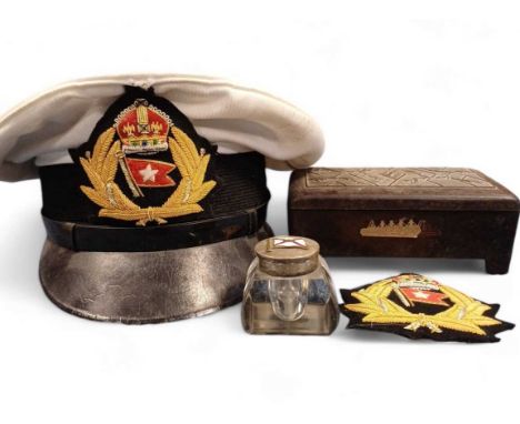 White Star Line A cap with company crest; another crest; An early 20th-century BakerLite box with cruiseliner to the front; A
