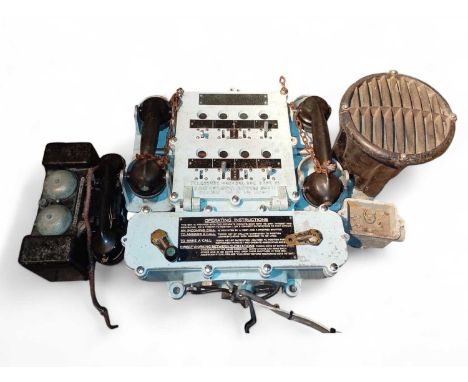 Warship Telephone control box type IV by the Telephone Mfg Co Ltd London With dual handsets and brass mounted controls and on