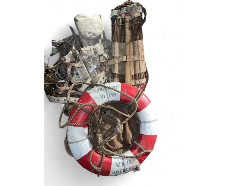 Shipwreck Rescue- Breeches Bouy A harness, two stretchers and a Breeches life ring.