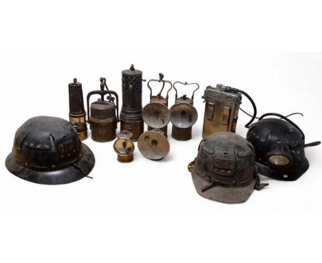 A collection of seven assorted vintage miners lamps. Including a Crestella and 'The Wolf, Radiator Lamp, 707649', Cornish-sty