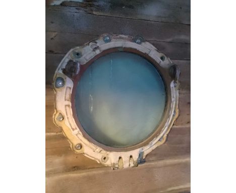 A Porthole Used within The Shackleton Exhibition  Glass 37cm in diameter, 54cm total.