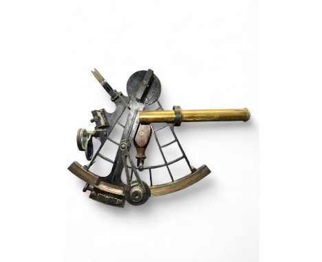 A sextant with inlaid silver scale