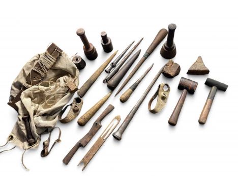 A collection of 19th century sail maker's tools  Various wooden fids, marlin spikes, punches etc.Longest fid 40cm