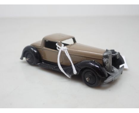 A Dinky Toys No.36b light brown Bentley 