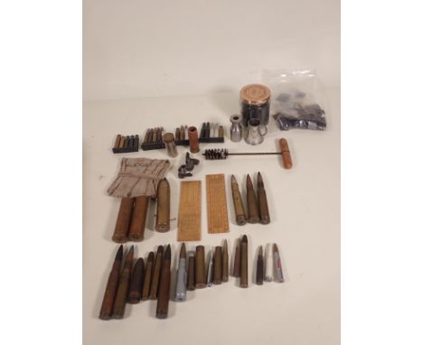 A quantity of cast lead Bullets for muzzle loading rifles; also a quantity of empty brass and inert Cartridge Cases; also a l