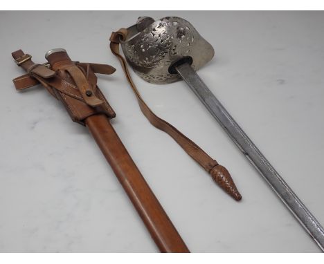 A First World War Officer's Dress Sword in leather covered wooden Scabbard with leather frog by Wilkinson Sword Co. Ltd 