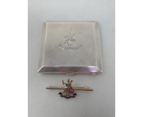 A 9ct gold and enamel Royal Norfolk Regiment Badge and a square silver Powder Compact with Royal Norfolk Crest, Birmingham 19