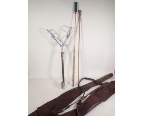 Two leather Gun Slips, a Shooting Stick, Walking Cane and a Cleaning Rod 