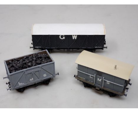 A Lawrence 00 gauge 10 ton G.W.R. Goods Van, an L.M.S. Coke Wagon and an L.M.S. Brake Van, all with Lawrence scale plates 