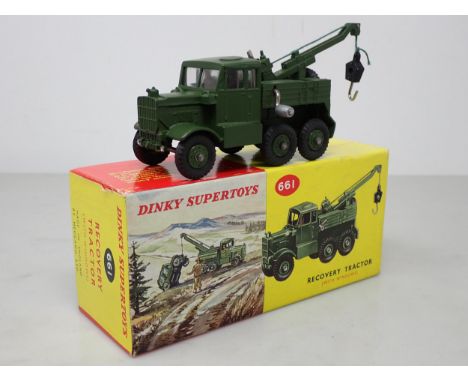 A rare Dinky Toys No. 661 Recovery Tractor with plastic hubs and windows in late type picture box with all packing 