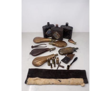 Three black powder Cannisters, five Powder Flasks, a Shot Flask and a Bullet Mould 