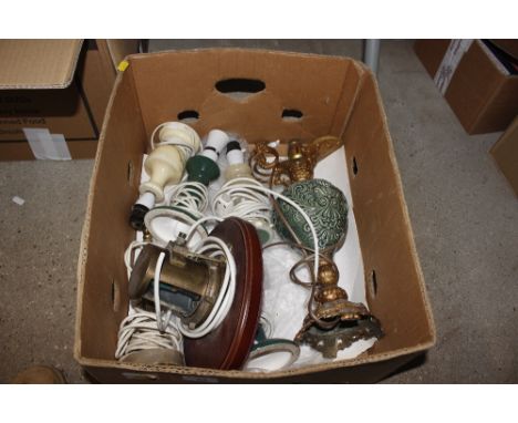A box containing miscellaneous lamps and light fittings