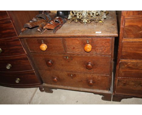 A 19th Century oak chest fitted two short over two long drawers, raised on bracket feet AF
