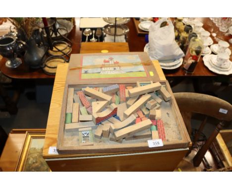 A box of vintage building blocks