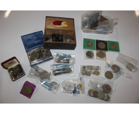 A collection of various commemorative coins, silver proof etc.