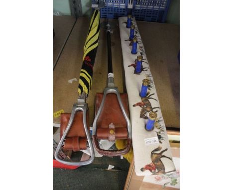 A coat rack for wall mounting, upholstered with Hunting scene, 90cm wide x 11cm high together with two 'Gamebird' folding lea
