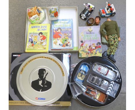 A Corgi 007 The Definitive Bond Collection, boxed, a Joe 90 mug, an Action Man, a Peter Rabbit musical ornament, two Mickey M