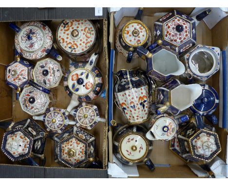 A collect of eleven Imari teapots, a caddy, jugs, water jug, etc.