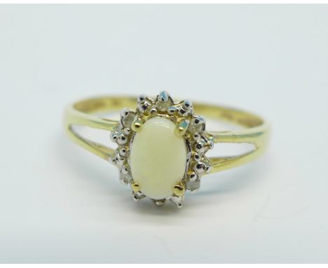 A 9ct gold, opal and diamond ring, 1.1g, O