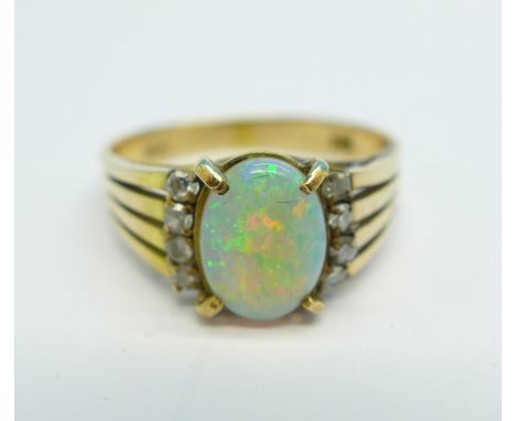 A 14ct gold, opal and diamond ring, 3.1g, P