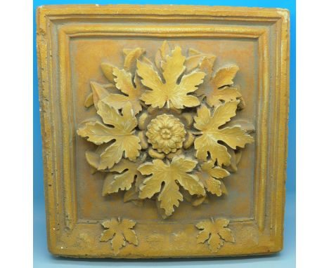 A Hayes-Parker square relief moulded tile with flower design